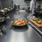 de Buyer Carbone Plus vasserpenyő segédfüllel nagy méretű sütésekhez