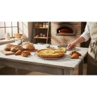 kerek rozsdamentes sütőrács pékáru hűtéséhez, professzionális konyhai környezetben