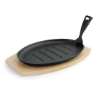 Ovális öntöttvas tálaló serpenyő fa alátéttel 27×17,5×2 cm – Német minőség - gasztrozoli.hu