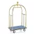 Bőröndszállító körbe gumis lökhárítóval integrált ruhatartó sínnel 3,8 cm-es titán arany csővázzal 2 forgós fékezhető és 2 db fix 15 cm kerékkel kék szőnyeggel
