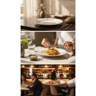 Boj fehér porcelán 26 cm-es főételes tányéron grillezett lazacfilé zöldspárgával, burgonyával és mártással, színes fine dining tálalásban, elegáns éttermi környezetben.