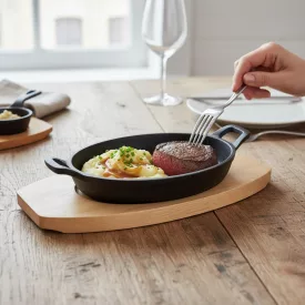 Öntöttvas ovális tálaló edény 21,5 cm fa alátéttel